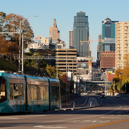 A streetcar runs along Main Street near the 18th and Vine district Friday, Nov. 7, 2025, in Kansas City, Mo. (AP Photo/Charlie Riedel)