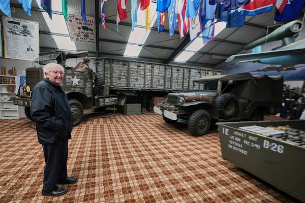 Director of the WWII Remember Museum 1939-1945, Marcel Schmetz, stands near vintage WWII vehicles inside his museum in Thimister-Clermont, Belgium, April 22, 2025. (AP Photo/Virginia Mayo)