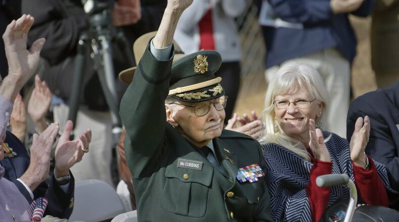 November 11, 2016 - Atlanta - Robert McCubbins, an Army Veteran and president of the Korean War Veterans Association, General Raymond G. Davis Chapter, receives applause as Korean War Veteran’s were recognized. The Veterans Day ceremony at the Atlanta History Center featured Bronze Star winner and journalist/author Joe Galloway, the 116th Army band, a bagpiper, and the Georgia Society of the American Revolution presenting the colors. BOB ANDRES /BANDRES@AJC.COM
