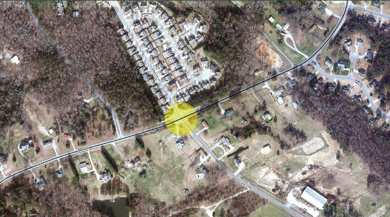 The Gwinnett County Board of Commissioners approved funding for a roundabout at Sardis Church Road and Doc Hughes Road in Buford.