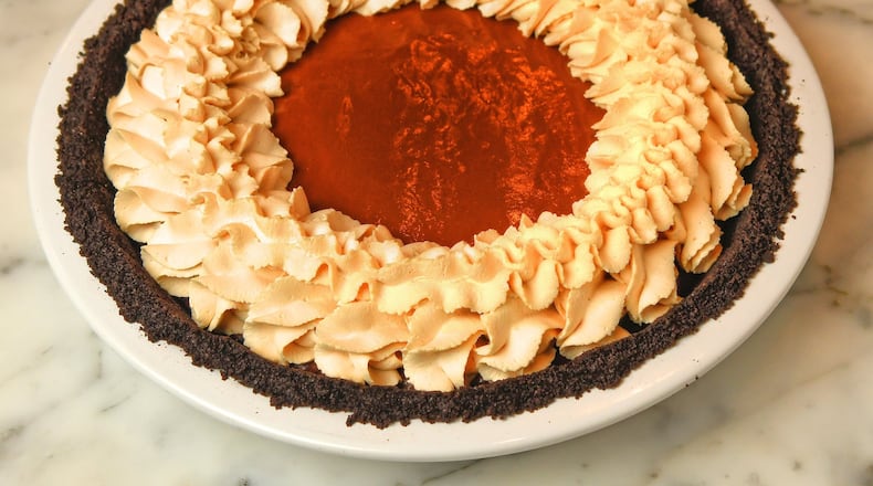 Deep Dark Mocha Cream Pie is topped with Espresso Whipped Cream and has coffee in the pie filling. STYLING BY PAUL ARGUIN AND CHRIS TAYLOR / CONTRIBUTED BY CHRIS HUNT PHOTOGRAPHY