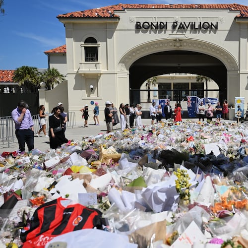 Floral tributes outside Bondi Pavilion at Bondi Beach in Sydney, Thursday, Dec. 18, 2025. (AP Photo/Steve Markham)