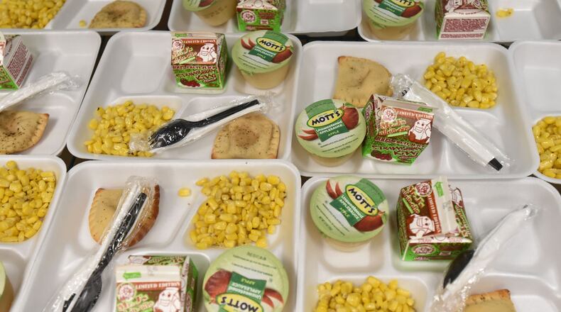 Free lunches will be offered at select DeKalb County Public Library branches through July 31 for children 18 and younger. HYOSUB SHIN / HSHIN@AJC.COM