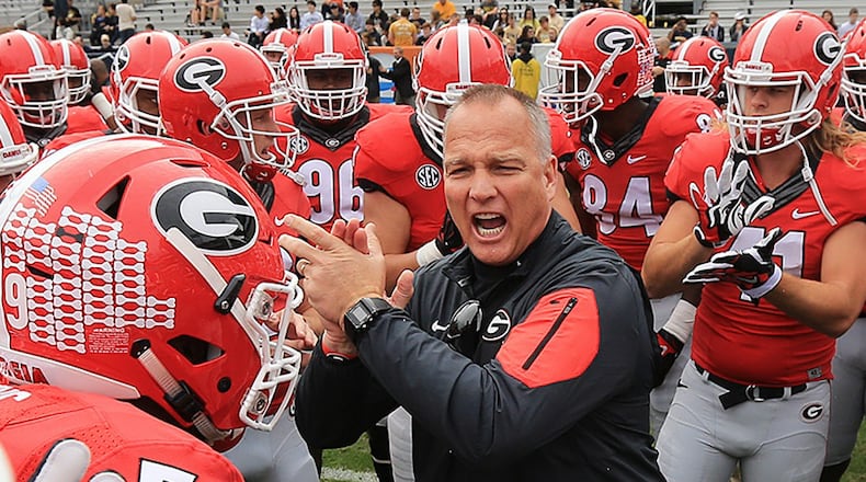 Georgia coach Mark Richt fires up his team as they prepare to play Georgia Tech on Saturday, Nov. 28, 2015, in Atlanta. This was Richt's last game as coach at Georgia.  Curtis Compton / ccompton@ajc.com