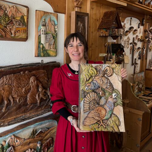 Jasmine Feuchter poses for a photo in a traditional craft shop in San Vigilio di Marebbe, northern Italy, Monday, Jan. 26, 2026. (AP Photo/Nicole Winfield)