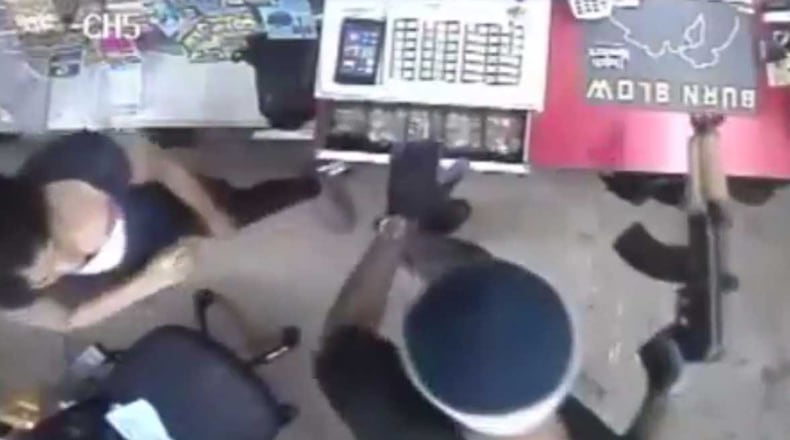DeKalb County police are looking for a suspect after an armed robbery at a store in the Lithonia area.