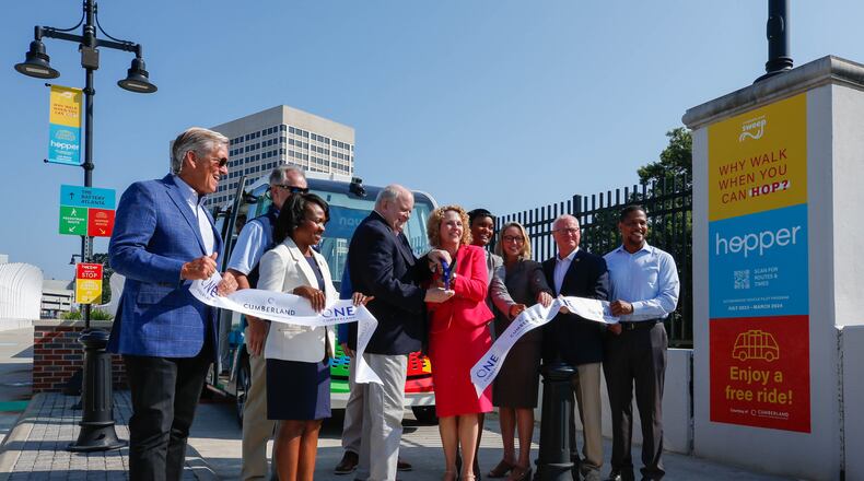 Officials cut the ribbon at the unveiling of the self-driving Cumberland Hopper in Cobb County on Tuesday, July 25, 2023. (Katelyn Myrick/katelyn.myrick@ajc.com)