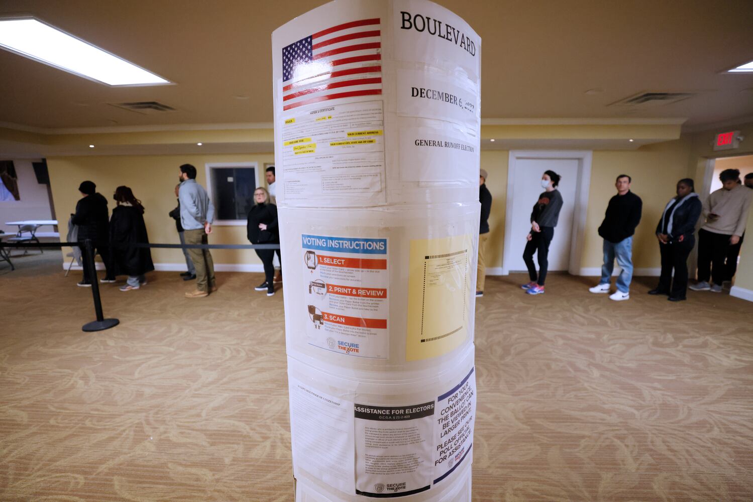 People wait in line expecting to vote during election day inside Israel Baptist Church with minimal wait times. The race between Warnock and Republican challenger Herschel Walker came to the last day for the US Senate runoff.
 Miguel Martinez / miguel.martinezjimenez@ajc.com
