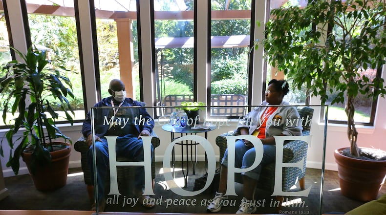 Walter Green, 64, and his wife Earlene, 63, of Fairfield, Ala., relax in the lobby of the Atlanta Hope Lodge in Decatur, where they are staying after his bone marrow transplant on Sunday, Oct. 5, 2014. The American Cancer Society's Hope Lodge provides free lodging to patients going through cancer treatment. CURTIS COMPTON / CCOMPTON@AJC.COM