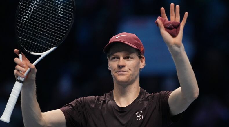 Italy's Jannik Sinner celebrates after winning against Germany's Alexander Zverev during their tennis match of the ATP World Tour Finals, in Turin, Italy, Wednesday, Nov. 12, 2025. (AP Photo/Antonio Calanni)