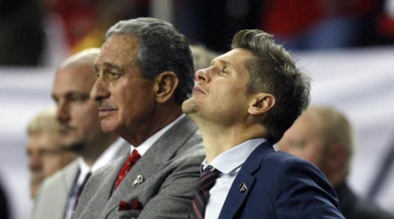 Things are not looking up for Falcons GM Thomas Dimitroff (right) and team owner Arthur Blank. (Curtis Compton / AJC)