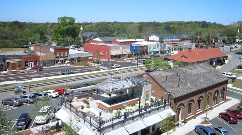 Woodstock has announced measures to ease the financial pressure on residents and businesses stemming from the COVID-19 crisis. AJC FILE