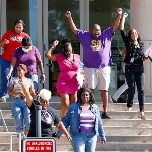 Supporters of Karmelo Anthony react after Judge John Roach Jr. was recused from the next phase of Anthony's murder trial outside the Collin County Courthouse on Wednesday, Aug. 19, 2026, in McKinney, Texas. (Elías Valverde II/The Dallas Morning News via AP)