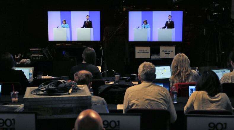 Republican Karen Handel and Democrat Jon Ossoff squared off Thursday morning for what is likely their final debate. BOB ANDRES /BANDRES@AJC.COM