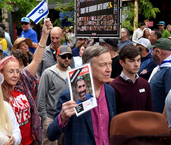 U.S. Sen. John Hickenlooper marches during a rally at the Boulder Jewish Festival in Boulder, Colo., on Sunday, June 8, 2025.(AP Photo/Thomas Peipert)