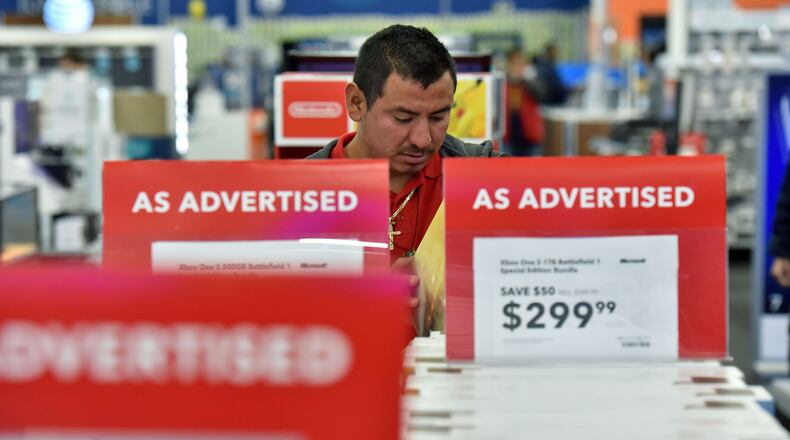 Brick-and-mortar retailers say that legislation introduced in the Georgia House would level the playing field with online retailers who often do not charge state sales taxes. The bill would require major online retailers to either collect and remit to the state sales taxes on purchases or send “tax due” notices each year to customers. Copies of the notices would go to the state Department of Revenue so it would know who owes the money. A state fiscal analysis suggests collecting those taxes could mean an extra $274 million in revenue for the state and $200 million for local governments. The combined figure could hit $621 million by 2022. HYOSUB SHIN / HSHIN@AJC.COM