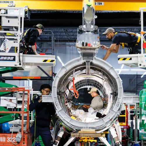 Mechanical engineers assembling the Quarterhorse Mk 2.2 aircraft at Hermeus’ Doraville facility on Tuesday, May 12, 2026. Hermeus, a company developing supersonic aircraft, aims to carry out its third test of an uncrewed, remotely piloted aircraft this coming fall. (Miguel Martinez/AJC)
