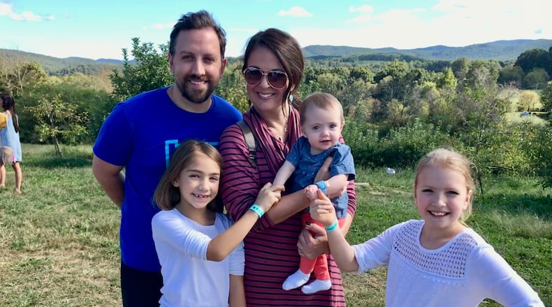 Jonathan and Allie Chambers, and their children: Gracie, 11; Natalie, 8; and Maggie, 14 months. HANDOUT