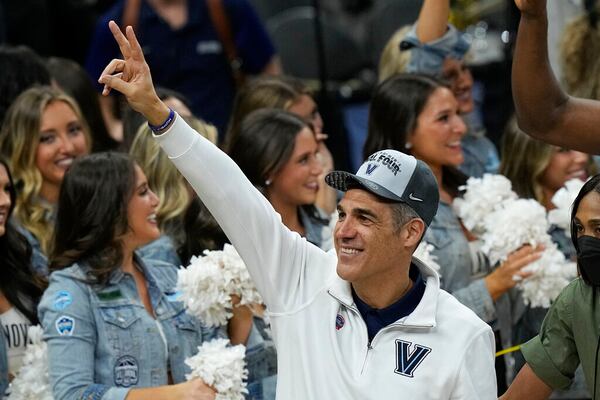 Villanova head coach Jay Wright leaves the court after their win against Houston during a college basketball game in the Elite Eight round of the NCAA tournament on Saturday, March 26, 2022, in San Antonio. (AP Photo/Eric Gay)