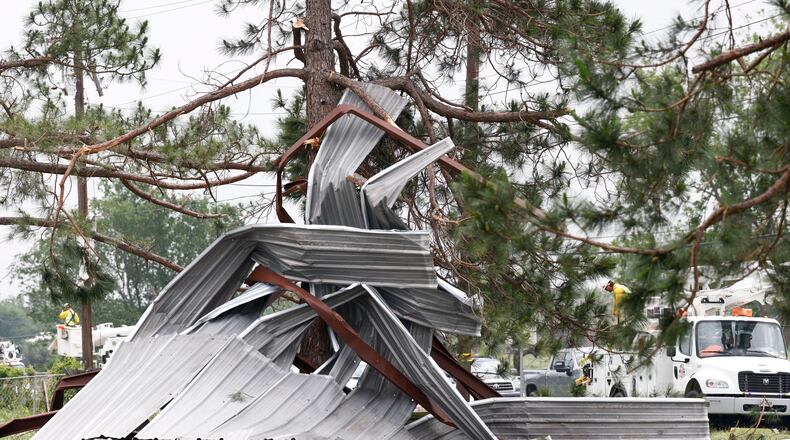 A meal building rests twisted in a tree after a possible tornado, Sunday, April 26, 2026, in Springtown, Texas (Elías Valverde II/The Dallas Morning News via AP)
