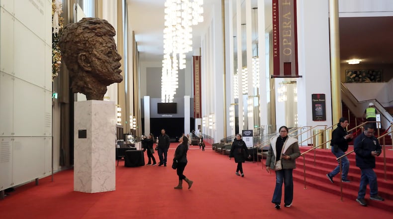 FILE - Visitors walk at the John F. Kennedy Memorial Center for the Performing Arts, Nov. 22, 2025, in Washington. (AP Photo/Rahmat Gul, File)