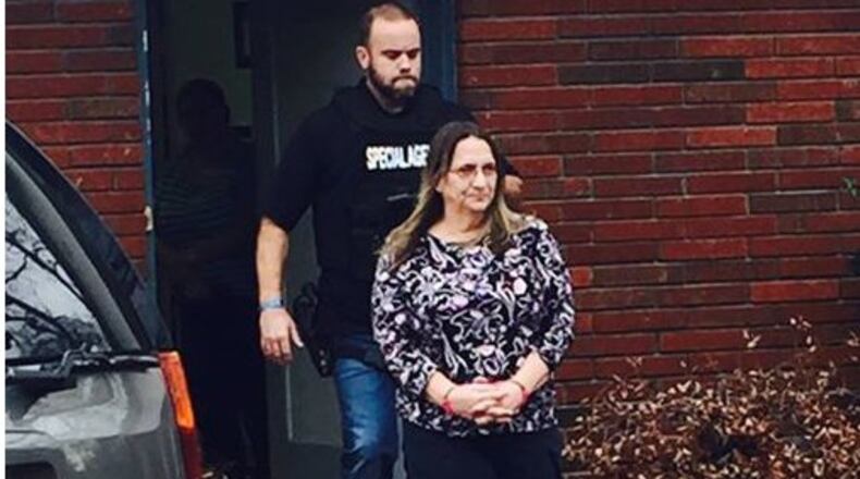 Josh Waites, the chief investigator for the state Department of Revenue, arrests Hapeville City Councilwoman Ruth Barr on Jan. 11. The arrest on a perjury charge was part of a state fraud investigation into Barr’s tax preparer’s business.