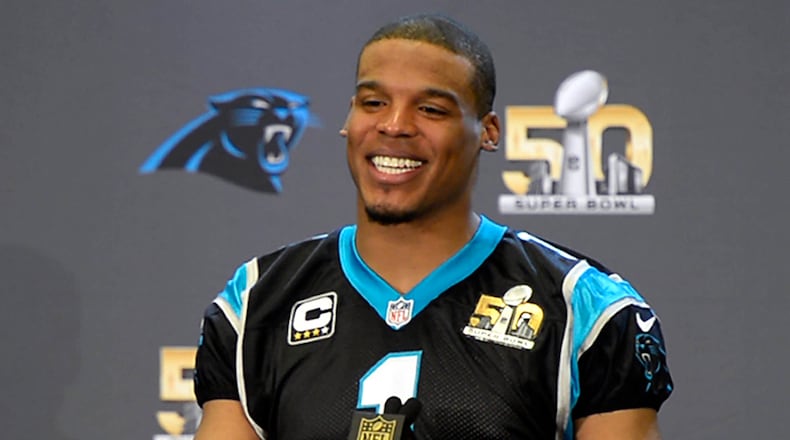 Carolina Panthers quarterback Cam Newton answers a question during a media interview session on Wednesday at the San Jose Convention Center. (David T. Foster III / Charlotte Observer)