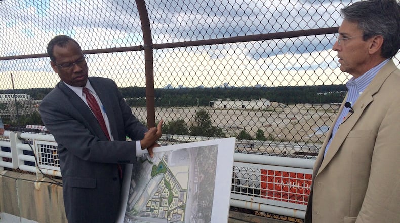Egbert Perry, left, and Dave Schmit, two partners in the redevelopment of the former General Motors plant in Doraville, discuss their plans for the site Tuesday, Aug. 16, 2016 during a media tour. J. Scott Trubey/strubey@ajc.com