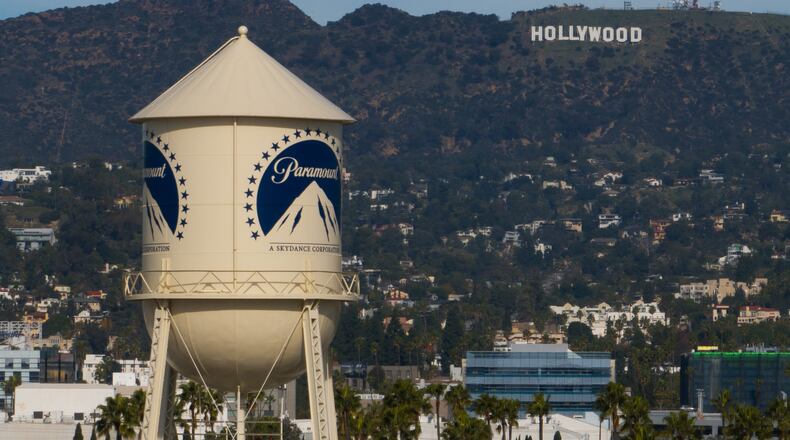 FILE - The Paramount Pictures water tower is seen in Los Angeles, Dec. 18, 2025, with the Hollywood sign in the distance. (AP Photo/Jae C. Hong, File)