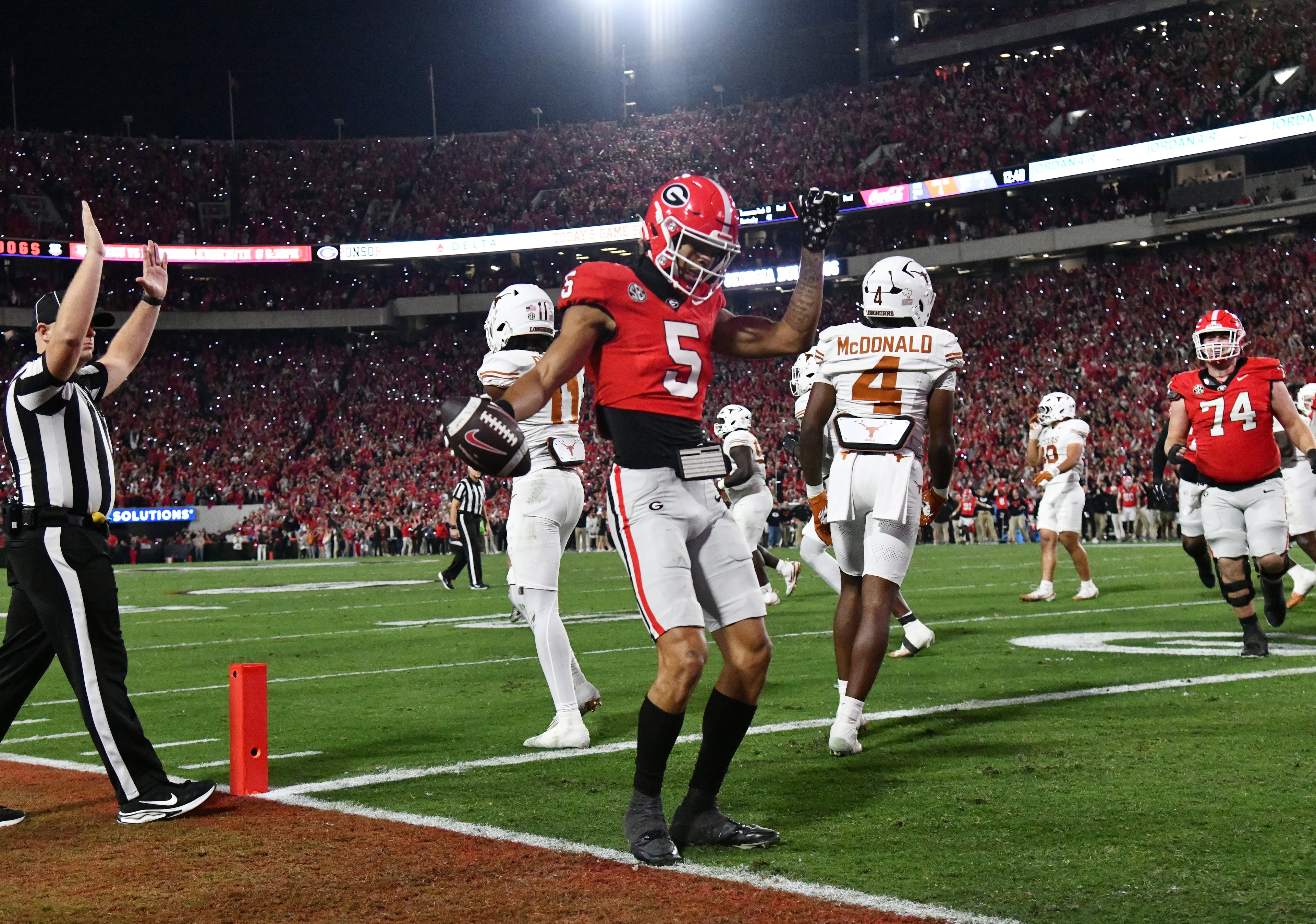Georgia wide receiver Noah Thomas (5) celebrates after scoring a touchdown during the first half in an NCAA football game at Sanford Stadium, Saturday, November 15, 2025, in Athens. (Hyosub Shin / AJC)