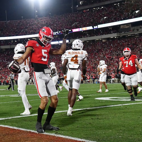 Georgia wide receiver Noah Thomas (5) celebrates after scoring a touchdown during the first half in an NCAA football game at Sanford Stadium, Saturday, November 15, 2025, in Athens. (Hyosub Shin / AJC)