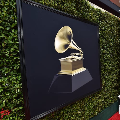 FILE - Decorative Grammy Awards appear on the red carpet at the 64th annual Grammy Awards in Las Vegas on April 3, 2022. (Photo by Jordan Strauss/Invision/AP, File)
