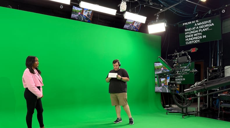 CBS Atlanta news anchor Jobina Fortson-Evans (left) and director Sam Snook attend a newscast rehearsal on Friday, Sept. 5, 2025, in Atlanta. (Courtesy of Alex Sanz/CBS News Atlanta)