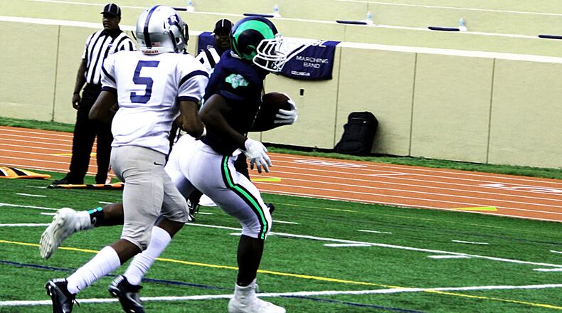 Arabia Mountain's Desmond Rocker tries to turn the corner.