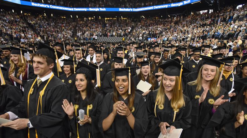 May 2, 2015 Atlanta - Georgia Tech graduates sing the school's fight song at the end of the Bachelor's morning ceremony of Spring 2015 Commencement at the McCamish Pavilion on Saturday, May 2, 2015. HYOSUB SHIN / HSHIN@AJC.COM