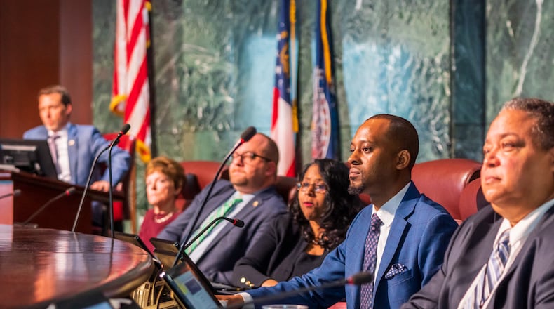 From far left to right: Atlanta City Council President Doug Shipman is joined by councilmembers Mary Norwood, Dustin Hillis, Andrea Boone, Antonio Lewis, and Michael Julian Bond during the full council's March 6, 2023 meeting.