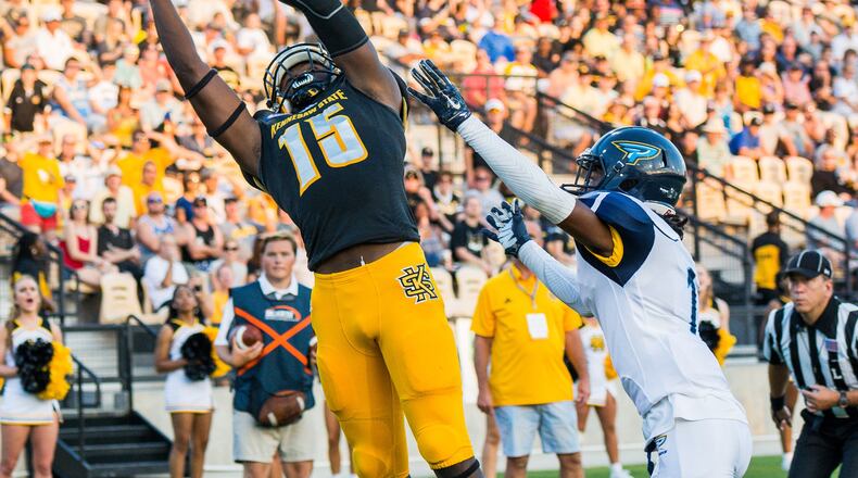 Kennesaw State wide receiver Justin Sumpter jumps to catch a pass for a touchdown. The sophomore leads the Owls with six touchdown recpetions on the season. (AJC/Cory Hancock)