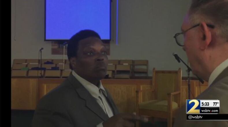Local pastor Alfred T. Lance and Poston Road Baptist Church Elder Pete Maynard bump heads over bylaws. (Credit: Channel 2 Action News)