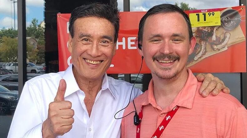 Robert Kim with James Whitten, who used to be the store manager at the Cherokee Plaza Kroger. (Photo provided by Robert Kim)