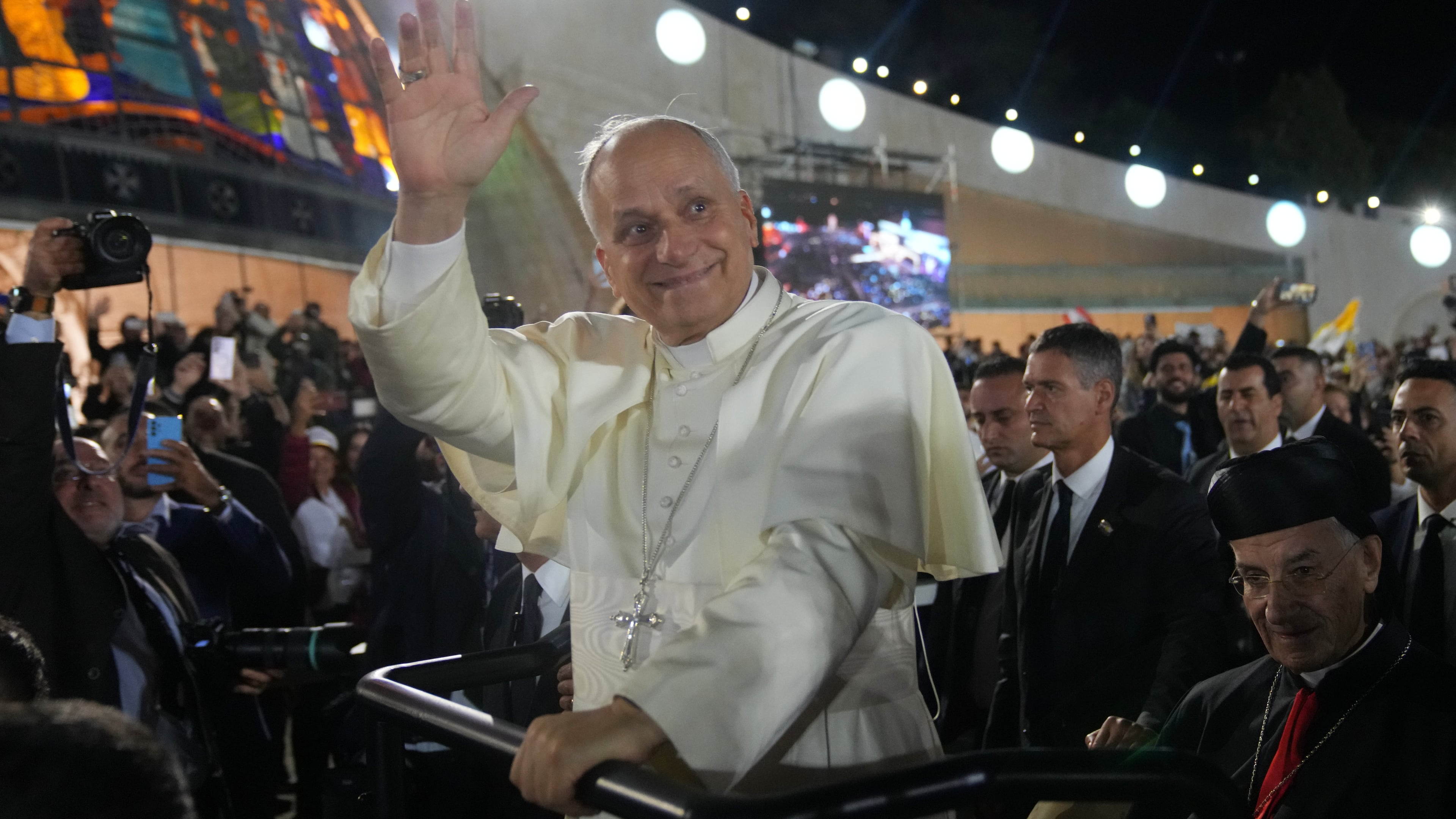 Pope Leo XIV arrives for a meeting with young people in the Square in front of the Maronite Patriarchate of Antioch in Bkerke, Lebanon, Monday, Dec. 1, 2025. (AP Photo/Domenico Stinellis)