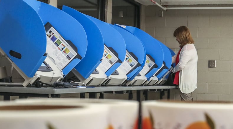 Wanda Jackson casts her vote at the Best Friend Park precinct at 6224 Jimmy Carter Boulevard in Norcross on Tuesday, March 19, 2019. JOHN SPINK/JSPINK@AJC.COM