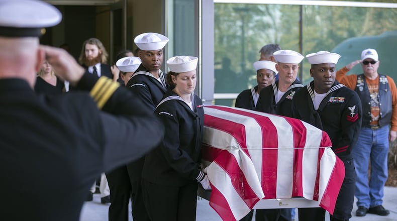 Navy personnel carry the casket of Cameron Walters, 21, of Richmond Hill, after his funeral service in Savannah in December. Walters was one of the three sailors killed in the Dec. 6 shooting at Naval Air Station Pensacola. (AJC Photo/Stephen B. Morton)