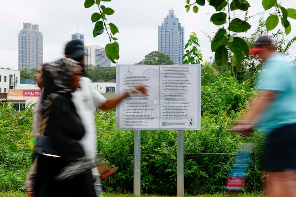 Like many municipalities, Atlanta is reliant on federal funding, including for projects like the Beltline. Pedestrians pass an artist installation near Ponce City Market on Sunday, Aug. 1, 2025. (Miguel Martinez/AJC)