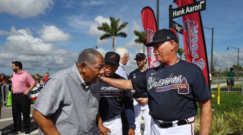 Braves manager Brian Snitker (right) and Terry Pendleton (center) thank Hank Aaron Tuesday, Feb. 18, 2020, after honoring the Hall of Famer by naming a street outside the Braves' new baseball complex in North Port, Fla.
