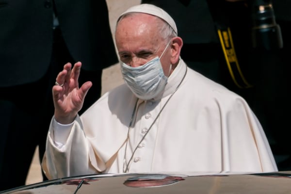 FILE - Pope Francis, wearing a protective face mask to help curb the diffusion of COVID-19, leaves at the end of his weekly open-air general audience in the San Damaso courtyard at the Vatican, Wednesday, June 16, 2021. (AP Photo/Domenico Stinellis, file)
