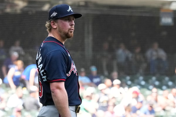 Atlanta Braves pitcher Spencer Schwellenbach (56) reacts to pitching a complete game after striking out the last batter of the game, Milwaukee Brewers' Jake Bauers, in the ninth inning of a baseball game Wednesday, June 11, 2025, in Milwaukee. (AP Photo/Kayla Wolf)