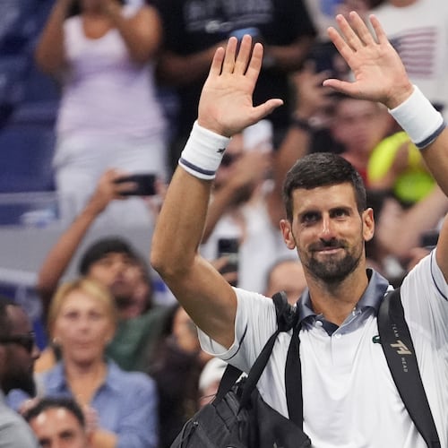Novak Djokovic, of Serbia, gestures to the crowd after he lost to Mariano Navone, of Argentina, during the first round of the U.S. Open tennis championships Sunday, Aug. 30, 2026, in New York. (AP Photo/Frank Franklin II)