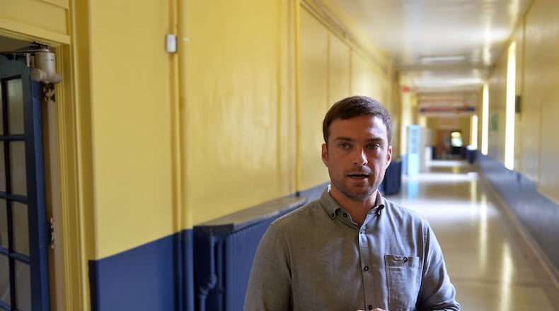 WonderRoot executive director Chris Appleton is on leave as the board investigates complaints about his behavior. He is seen here at the 54,000-square-foot former elementary school that became the headquarters of the Reynoldstown arts nonprofit. KENT D. JOHNSON/KDJOHNSON@AJC.COM
