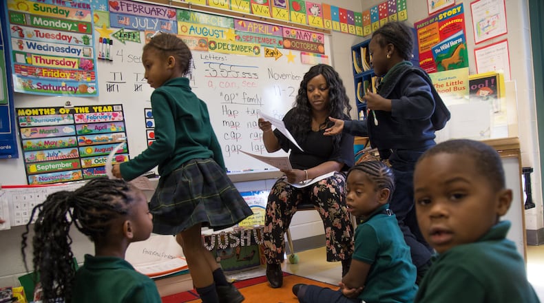 Students at Narvie Harris Traditional Theme School, shown here in 2017, have uniform and hairstyle rules they adhere to after signing a contract when they are selected to attend the school. (AJC FILE PHOTO)