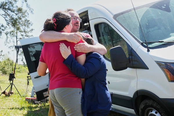 Supporters hug outside the Central Louisiana Ice Processing Center in Jena, La., after an immigration hearing for Mahmoud Khalil, the Columbia University activist facing deportation for his role in pro-Palestinian campus protests, Friday, April 11, 2025. (AP Photo/Gerald Herbert)